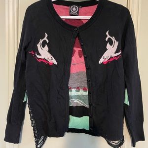Black shark "bite" cardigan, by the brand Banjo & Cake via Too Fast clothing